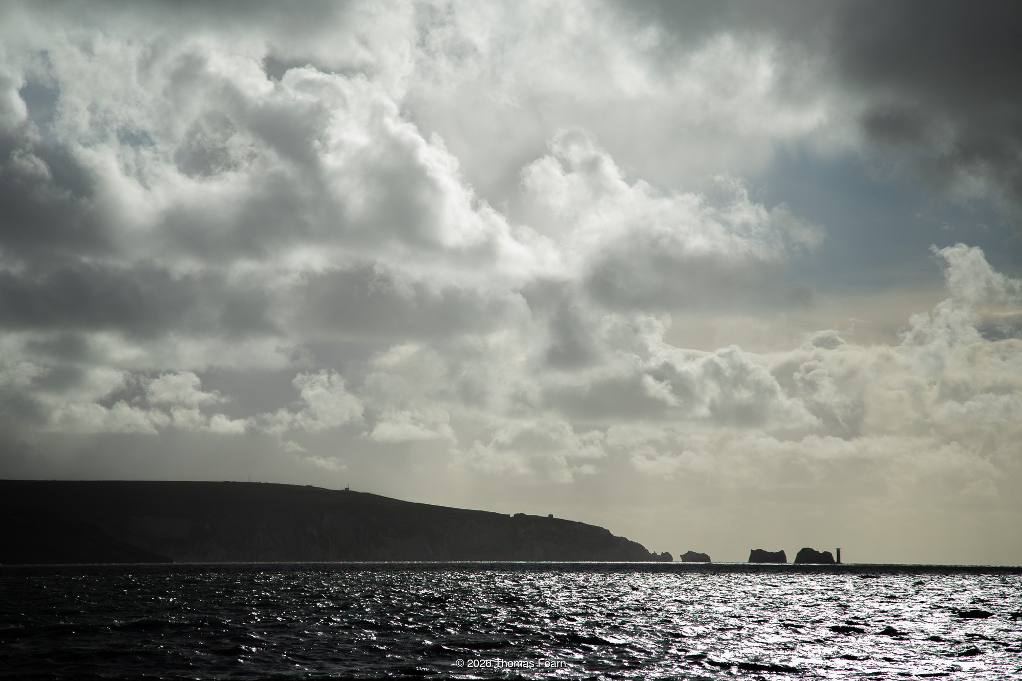 Stormy black and white coastline